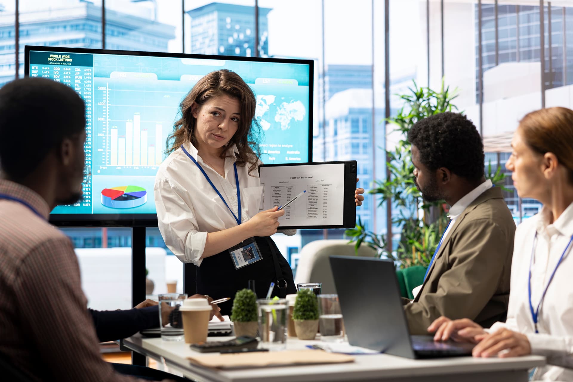 Accounting manager reviewing budget numbers and compliance documentation.